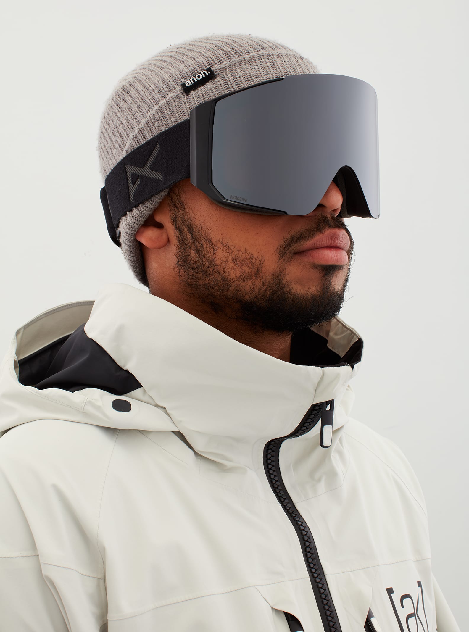 Anon Anon Sync Goggles + Bonus Lens Frame: smoke, lens: perceive sunny onyx (6% / s4), spare lens: perceive variable violet (34% / s2)