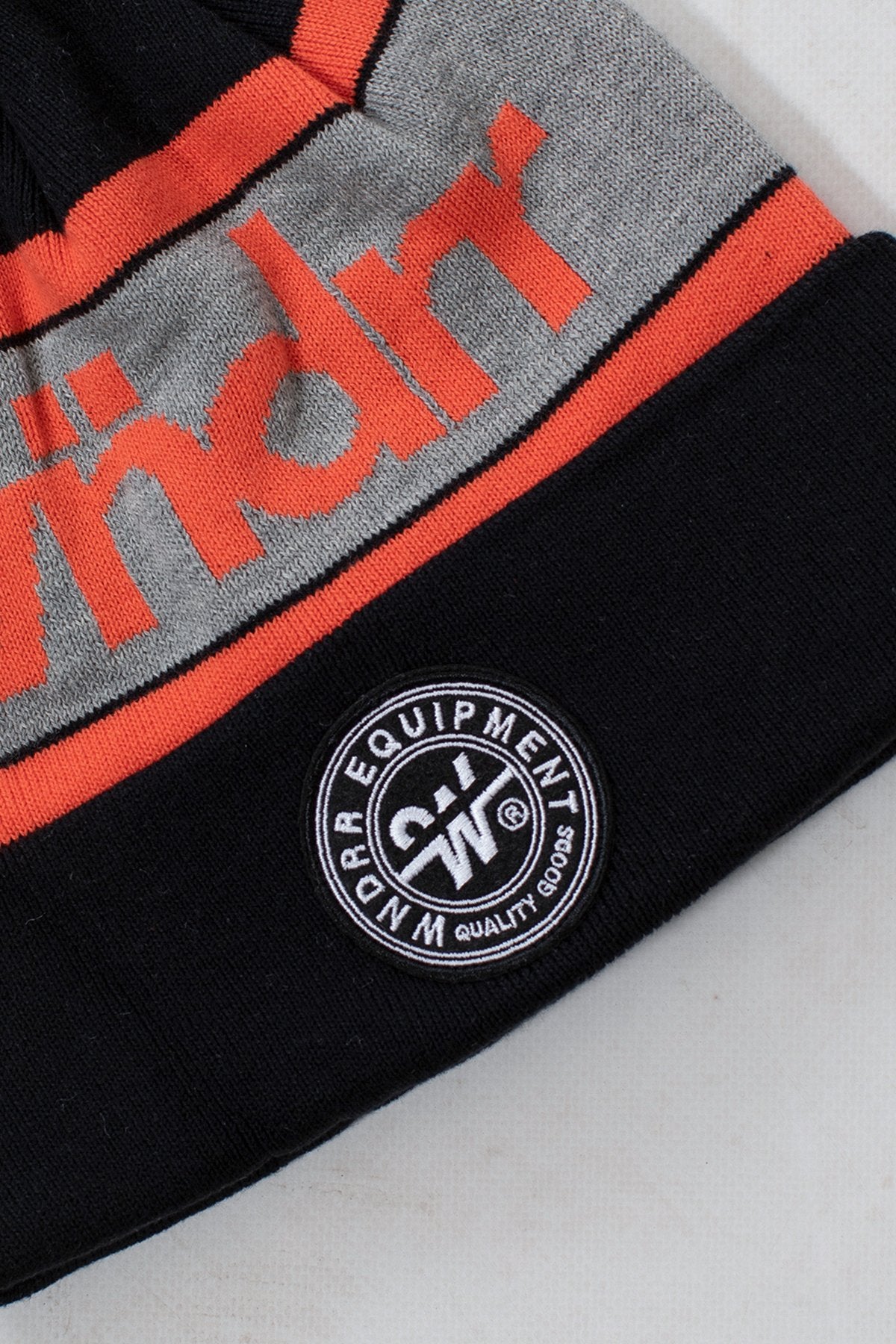 WNDRR CLUSTER POM POM BEANIE Black/orange/grey