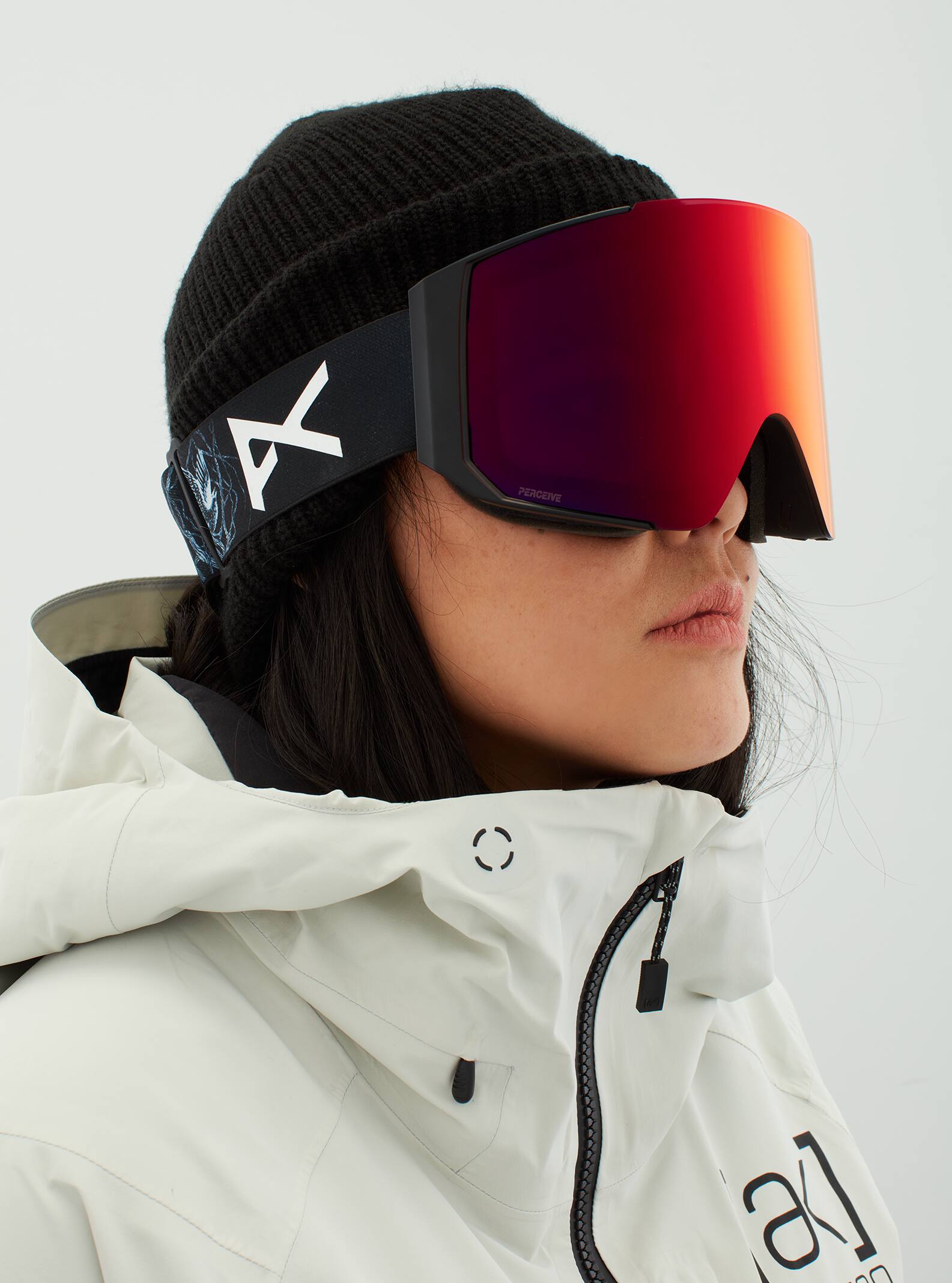 Anon Anon Sync Goggles + Bonus Lens - Low Bridge Fit Frame: rocka, lens: perceive sunny red (14% / s3), spare lens: perceive cloudy burst (59% / s1)